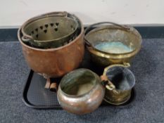 A tray of antique brass and copper ware, jam pans,