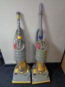 Two Dyson DC01 upright vacuums