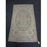 A Kashmiri hand stitched wool hanging rug 150 cm x 85 cm