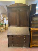 A George III oak bureau bookcase