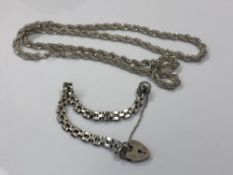 A silver padlock bracelet, together with a white metal rope twist necklace, apparently unmarked.