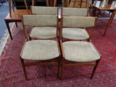 A set of four Danish mid 20th century teak dining chairs