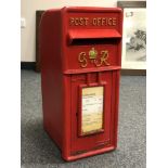 An original George VI red painted metal post office box,