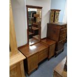 An early 20th century inlaid mahogany dressing table