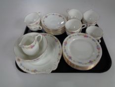 A tray of thirty one pieces of Foley floral pattern china