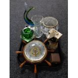 A tray of ship's wheel barometer, travel clock, mantel clock,