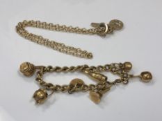 A heavy gilt metal charm bracelet, together with a gilt necklace.