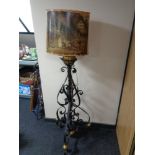 A Victorian cast iron and brass standard oil lamp (converted) with shade