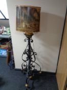 A Victorian cast iron and brass standard oil lamp (converted) with shade