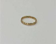 A 14ct gold band ring, size K CONDITION REPORT: 1.