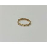 A 14ct gold band ring, size K CONDITION REPORT: 1.