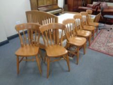 A set of six pine kitchen chairs