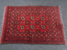 An Afghan rug,