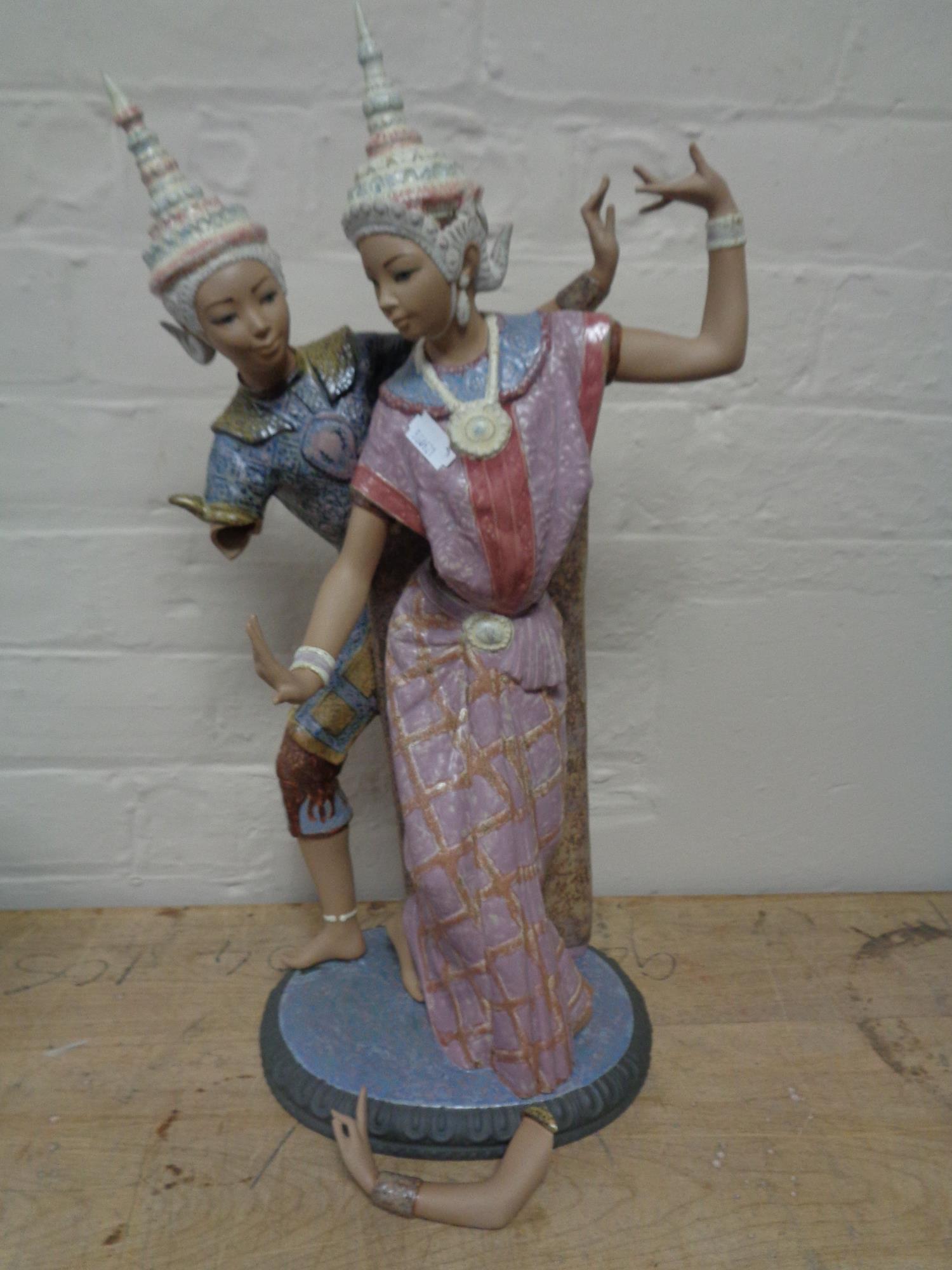 A large Lladro figure group of Thai dancers (a/f), height 53 cm.
