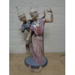 A large Lladro figure group of Thai dancers (a/f), height 53 cm.