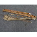 A four piece vintage split cane fly rod in carry bag together with a further three piece split cane