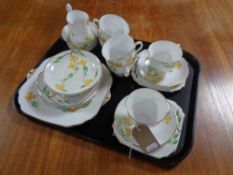 A tray of twenty one piece Phoenix hand painted bone china tea service