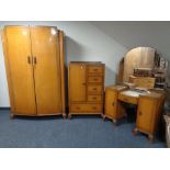 A 1930's oak three piece bedroom suite