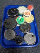 A tray of five assorted fly fishing reels and spools of line