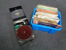 An early 20th century Columbia portable gramophone and a box of LP records including musicals,