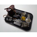 A tray of vintage flat irons, Carl Zeiss Jena 8 x 30 field glasses,