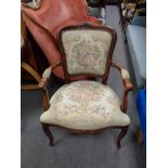 A French style salon armchair upholstered in a tapestry fabric