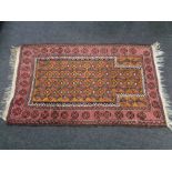 A Afghan prayer rug,