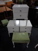 Three white two drawer bedside stands on raised legs together with a green dralon upholstered