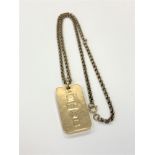 A 9ct gold ingot pendant on 9ct gold chain CONDITION REPORT: Gross weight 36.