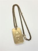 A 9ct gold ingot pendant on 9ct gold chain CONDITION REPORT: Gross weight 36.