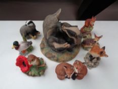 Eight small Border Fine Arts figures to include deer, badgers,