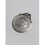 A Bank of Sierra Leone 10th Anniversary one Leone coin in pendant mount.