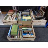 Four crates of hard back and paperback books - field guides to birds, angling, fox hunting,