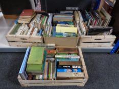 Four crates of hard back and paperback books - field guides to birds, angling, fox hunting,