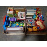 Two crates of children's toys to include early learning centre vehicles and figures and wooden