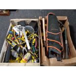 A box and crate containing a large quantity of hand tools, head torches,