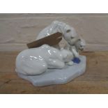 A Lladro figure group,