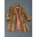 A lady's mink fur coat by Marcus of London