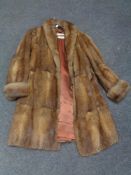 A lady's mink fur coat by Marcus of London