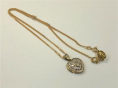 A 9ct gold diamond set heart pendant on non-gold magnetic clasp CONDITION REPORT: 8.