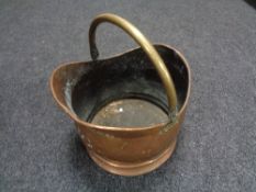 A 19th century copper and brass handled coal bucket