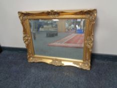 A decorative gilt framed mirror