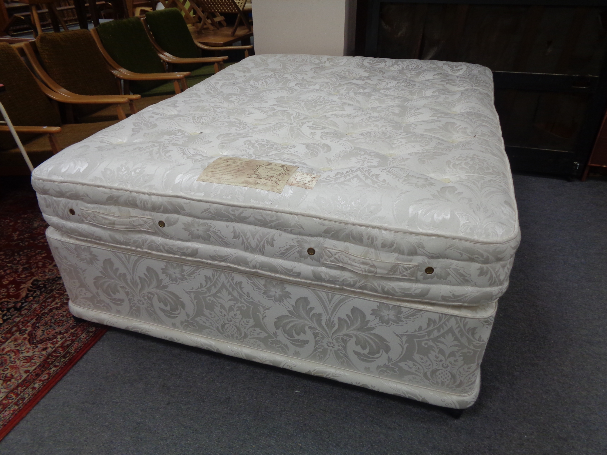 A Millbrook Collection Royal Crown 5' divan and interior