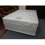 A Millbrook Collection Royal Crown 5' divan and interior