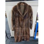 A lady's full length mink coat