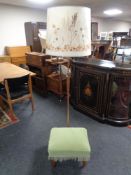 A 1970's copper and teak standard lamp with shade together with a green dralon upholstered stool on