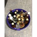 A tub of assorted whisky miniatures