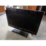 A Samsung 32 inch TV and remote (continental wiring)