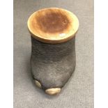 An early twentieth century elephants foot storage pot with wooden lid and lining, height 44 cm.
