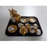 A tray of fifteen pieces of Bavarian gilded tea service